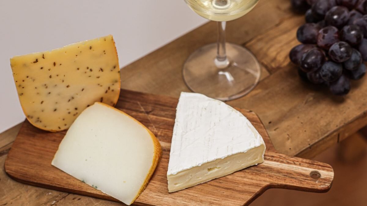 A cheese board with assorted cheeses